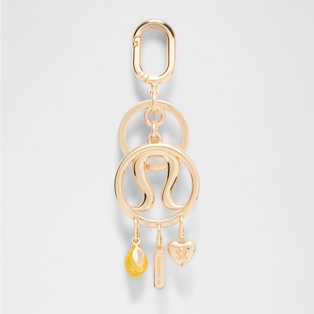 Lululemon Athletica Gold Logo Keychain with Charms
